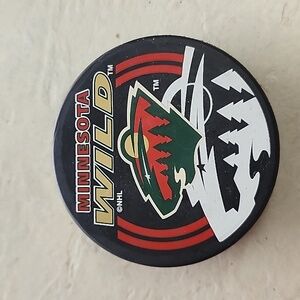 Retro Minnesota Wild NHL hockey puck